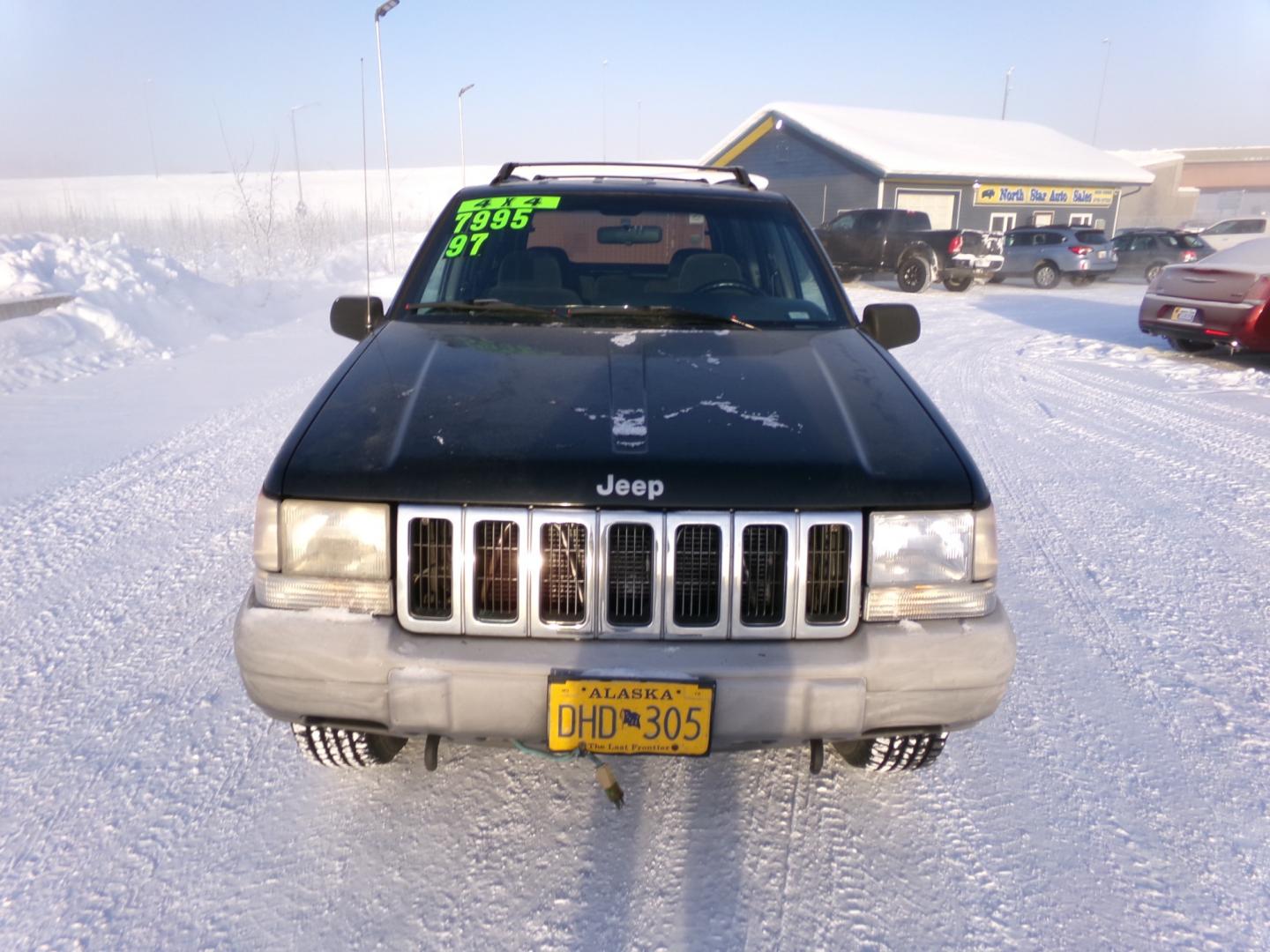 1997 Black Jeep Grand Cherokee Laredo 4WD (1J4GZ58S6VC) with an 4.0L L6 OHV 12V engine, 4-Speed Automatic Overdrive transmission, located at 2630 Philips Field Rd., Fairbanks, AK, 99709, (907) 458-0593, 64.848068, -147.780609 - Photo#1